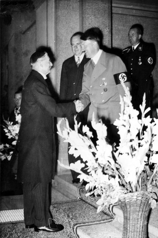 Adolf Hitler greets British Prime Minister Neville Chamberlain at the beginning of the Bad Godesberg meeting on 24 September 1938 in which Hitler demanded annexation of Czech border areas without delay, leading to the Godesberg Memorandum.