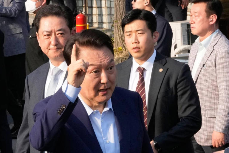 GOING THROUGH LITIGATION Ousted South Korean president Yoon Suk Yeol gestures before leaving the presidential residence in Seoul on April 11, 2025. AFP PHOTO